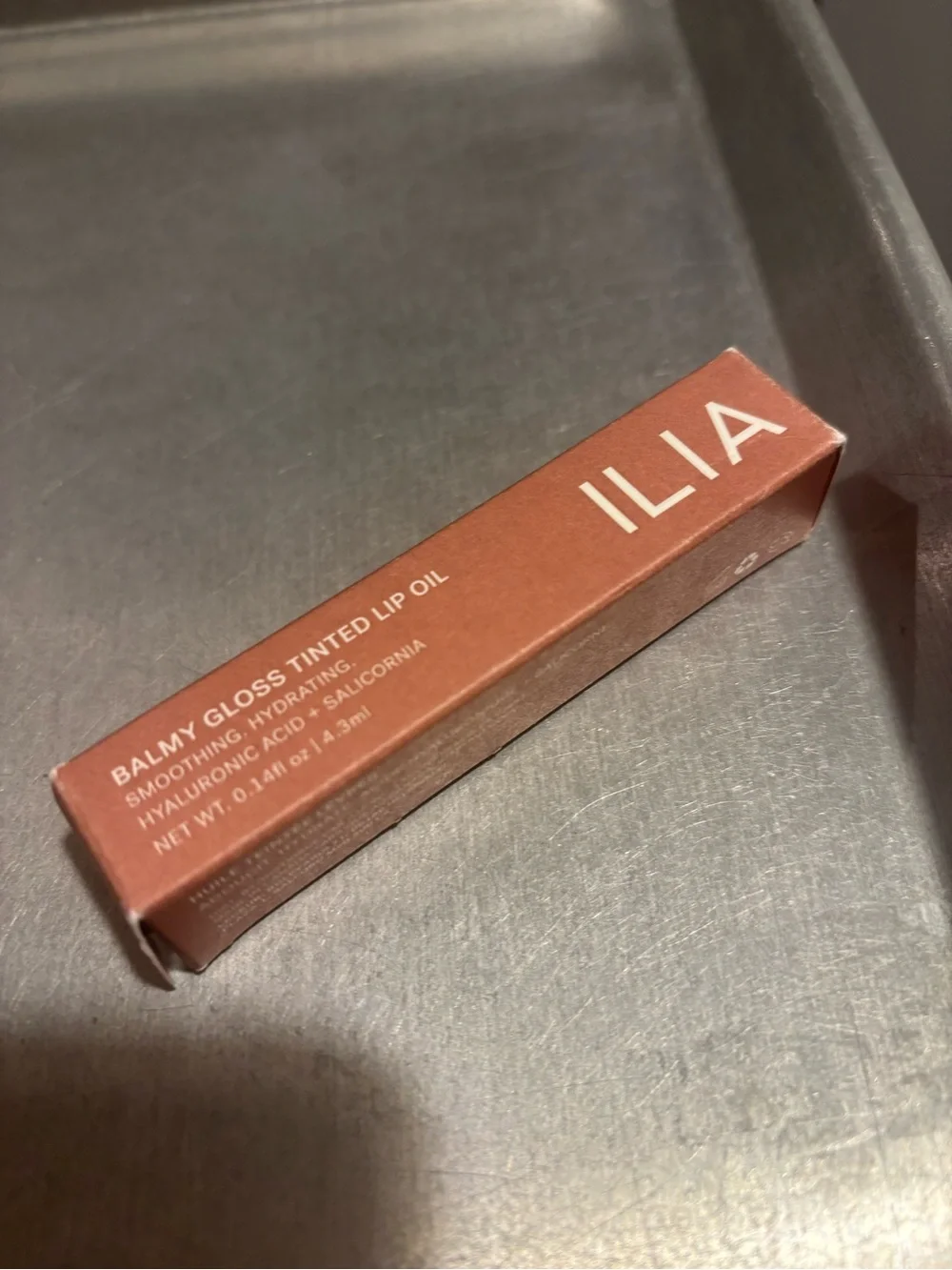 ILIA Linger Lip Gloss Balm in shade Linger a mauve